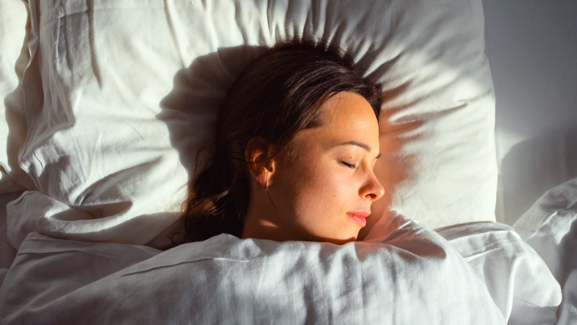 Sleeping young girl in bed